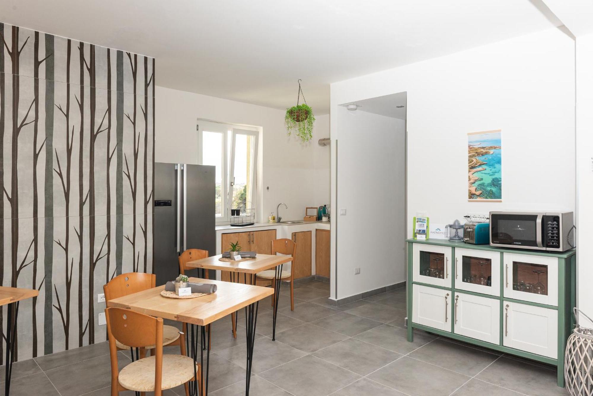 Guest House - Affittacamere Green Apartment - By Faendho Porto Torres Eksteriør billede